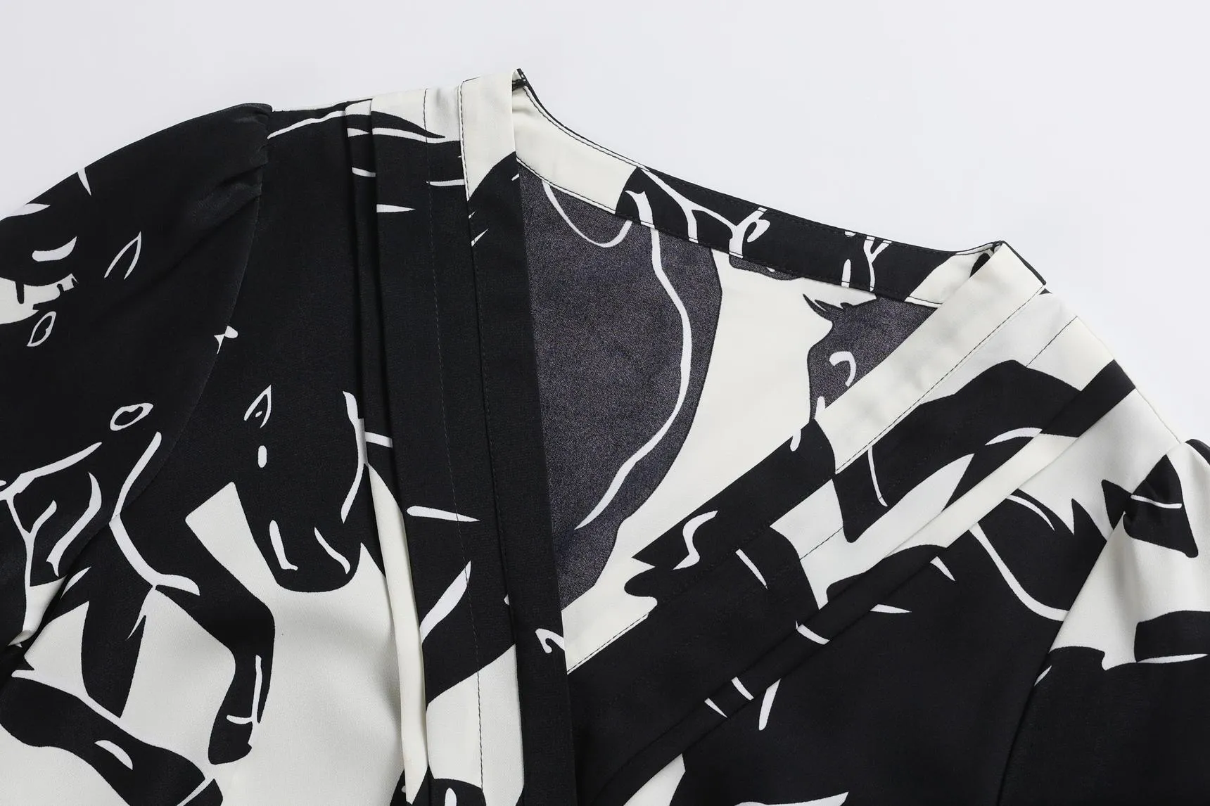 Calf-length Floral Dress with a Waist-Cinching Design