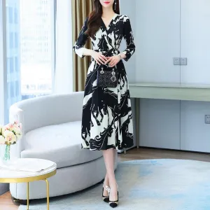 Calf-length Floral Dress with a Waist-Cinching Design