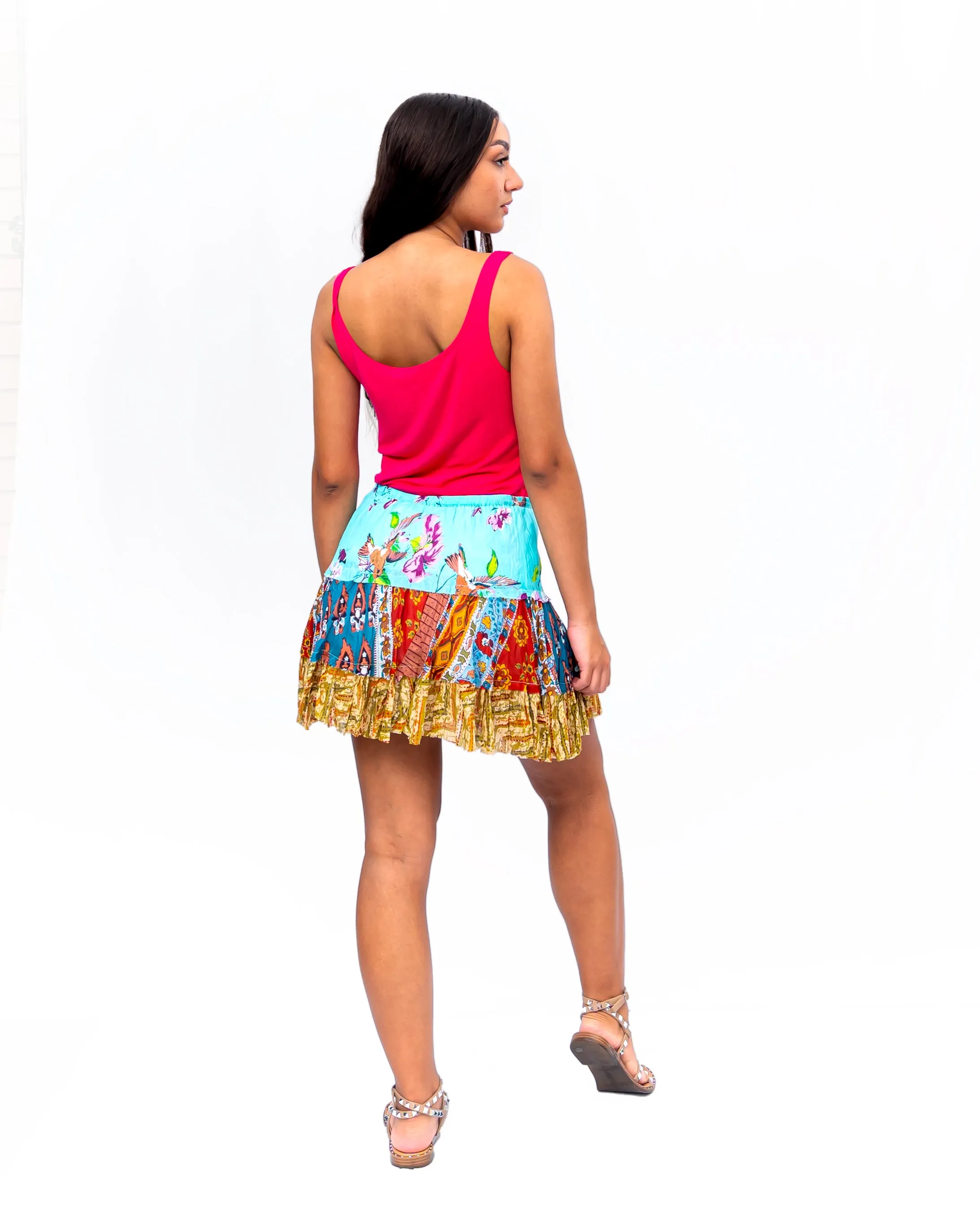 Three tiered Fabric mini ruffle skirt. In Multi.