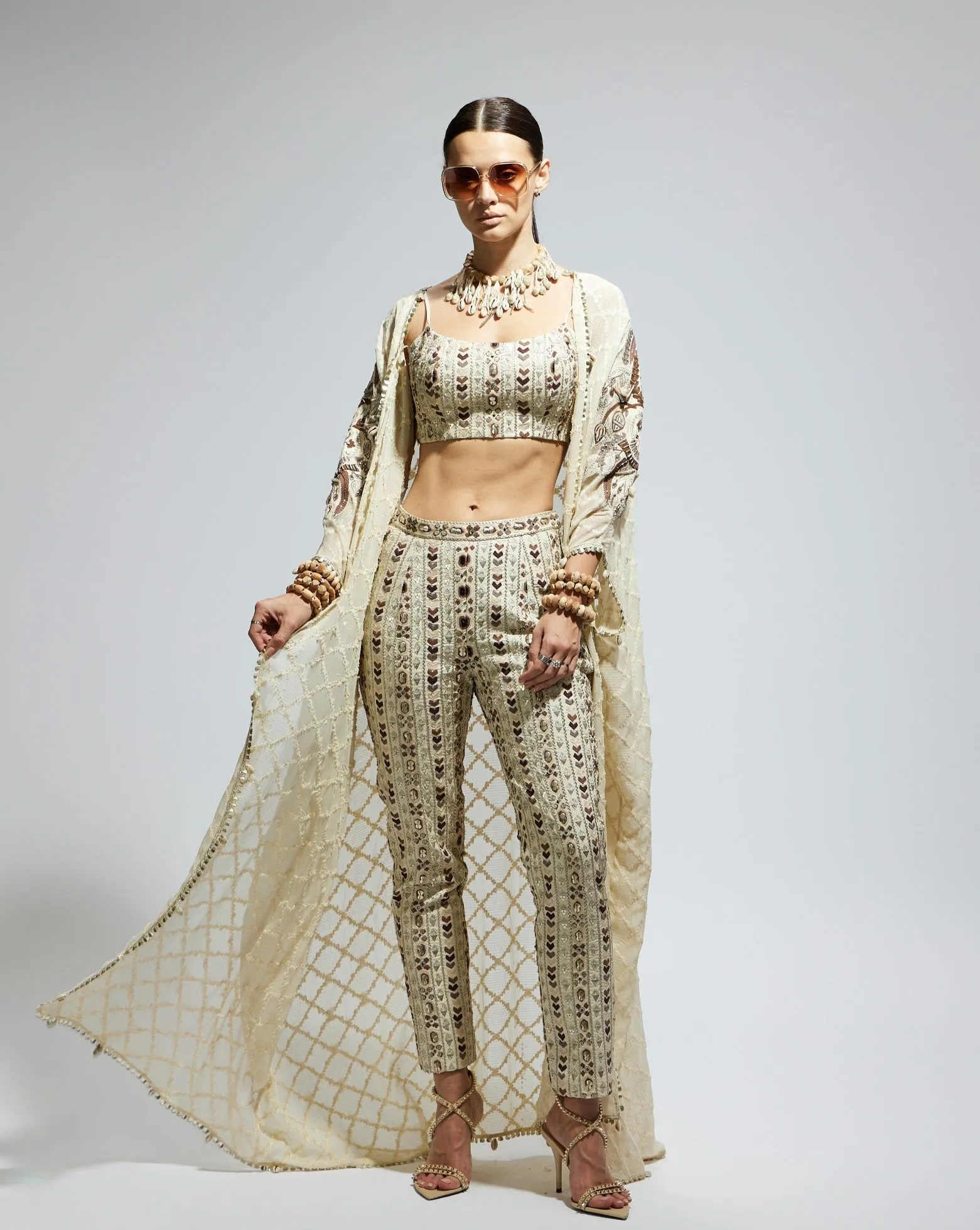 White embellished cape, bustier and pants